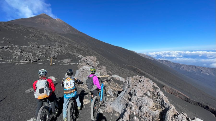 Clients at the viewpoint of Valle del Bove and South-east crater Clients at the viewpoint of Valle del Bove and South-east crater