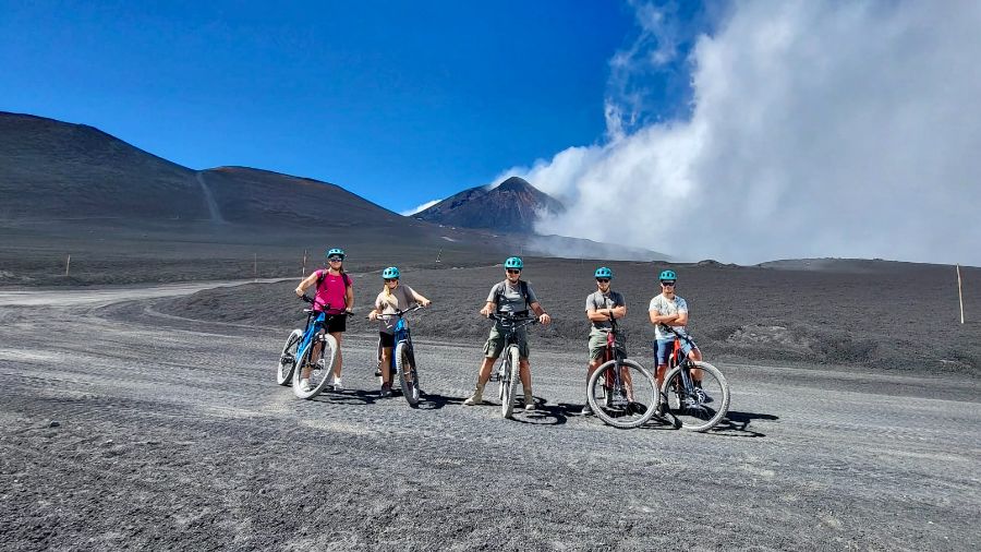 Beautiful group riding the Etna Summit craters with Into Etna Beautiful group riding the Etna Summit craters with Into Etna