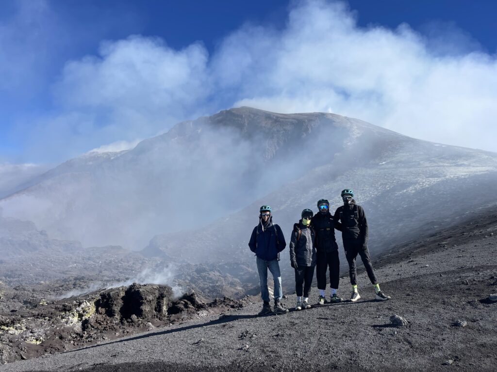 Etna Peak - Clients standing in front of the vents of Bocca Nuova