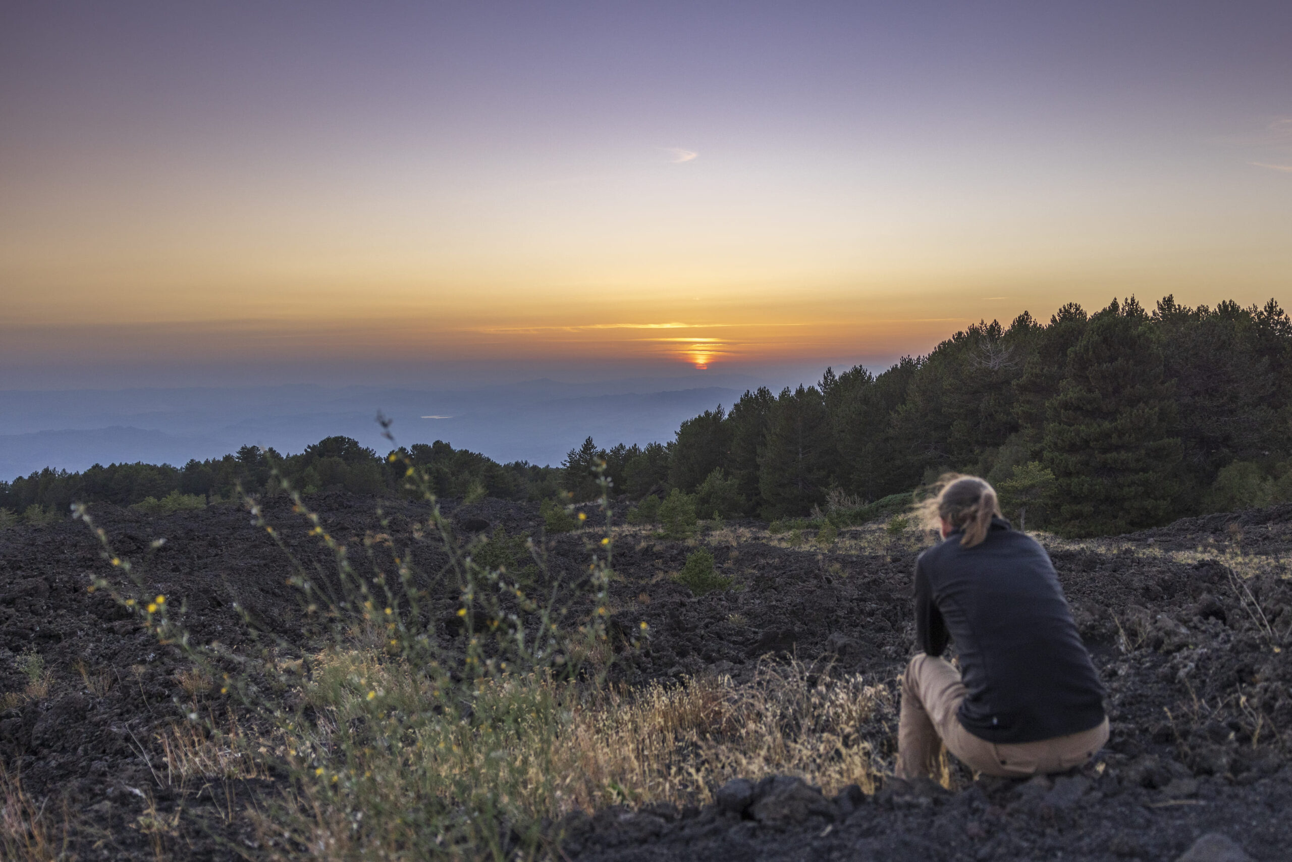 Etna Sunset Hike - Incredible moment of the Sunset setting down to the Horizon with clients taking pics Etna Sunset Hike - Incredible moment of the Sunset setting down to the Horizon with clients taking pics